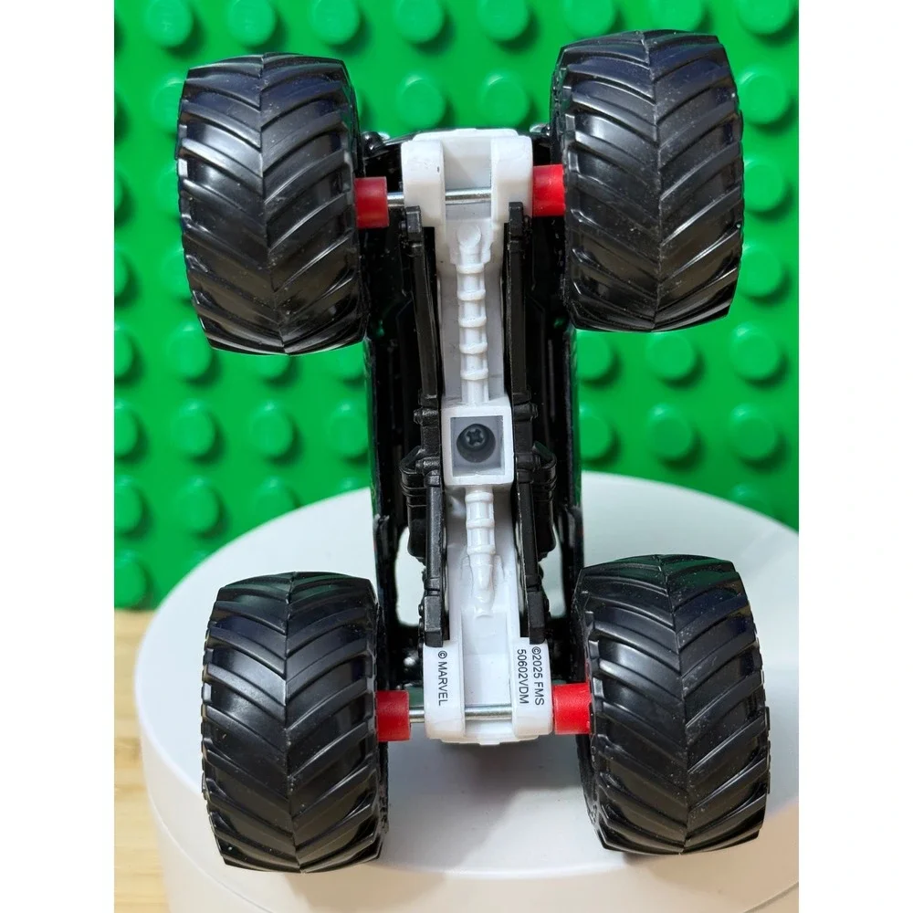 Monster Jam Marvel Venom Monster Truck Diecast Blue Black 1:64 Scale BKT Tires